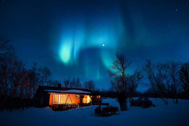 snowmobile trip aurora borealis